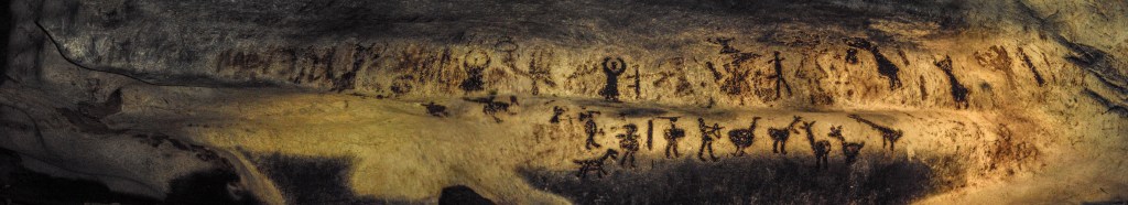 Ancient cave painting depicting human figures and animals, illustrating early human routines and survival habits.